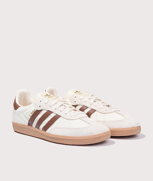 adidas Originals OG Samba trainers in Cream White/Preloved Brown/Wonder White at EQVVS Menswear. Front pair shot. 