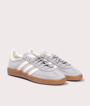 adidas Originals Handball Spezial Trainers in Grey Two/Cream White/Footwear White at EQVVS. Front pair shot. 