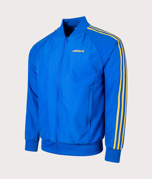 adidas Originals SST Track Top in Blue at EQVVS. Side shot. 