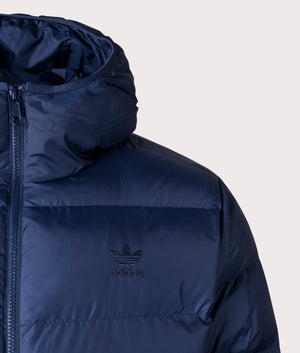 adidas Originals Tonal Hooded Puffer Jacket in Night Indigo Blue. Detail Shot at EQVVS