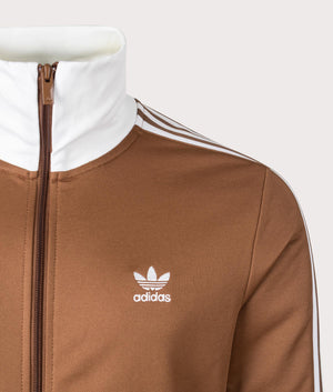 adidas Originals Classic Track Top in Preloved Brown at EQVVS. Detailed logo shot. 