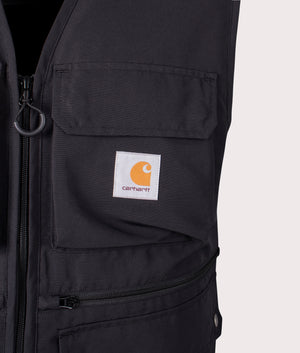 Carhartt WIP Irwin Vest in Black at EQVVS. Detailed logo shot. 