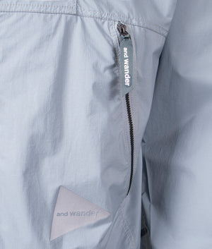 Nylon pertex jacket in light blue by and wander. shot at EQVVS. Detail shot. 