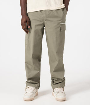 MKI Relaxed Fit Ripstop Cargo Pants in Sage Green. Front angle model shot at EQVVS.