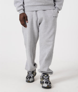 MKI Relaxed Fit Uniform Joggers in Grey. Front angle model shot at EQVVS.