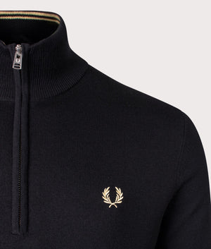 Fred Perry Classic Quarter-Zip Jumper in black, 54% Merino Wool, 46% Cotton at EQVVS. Logo Detailed shot. 