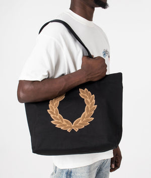 Laurel Wreath Canvas Tote Bag in Black by Fred Perry. EQVVS Shot.