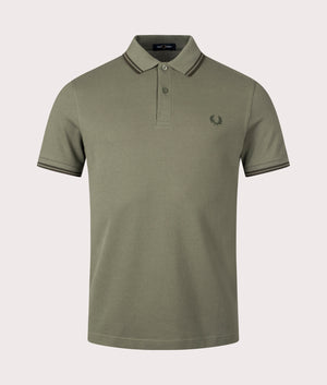 The Twin Tipped Fred Perry Polo Shirt in Laurel Wreath Green by Fred Perry. EQVVS Shot. 