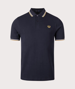 Fred Perry Twin Tipped Polo Shirt in Navy/Ecru. Shot at EQVVS. Front image. 