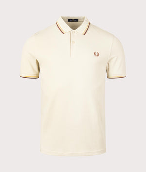 Fred Perry Twin Tipped Polo Shirt in Oatmeal/Honeycomb/Whiskey Brown. Shot at EQVVS. Front image. 