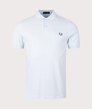 Fred Perry Polo Shirt in Light Ice/ Petrol Blue, 100% Cotton at EQVVS. Front Shot. 