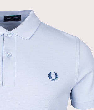 The Fred Perry Polo Shirt in Light Smoke Shaded Cobalt by Fred Perry. EQVVS Shot.