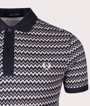 Fred Perry Zig Zag Print Polo Shirt in Snow White, 100% Cotton at EQVVS. Detail logo shot. 