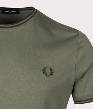 Twin Tipped T-Shirt in Laurel Wreath Green/Night Green, 100% cotton at EQVVS. Detailed logo shot. 