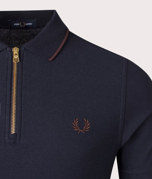 Crepe Pique Zip Neck Polo Shirt in Navy by Fred Perry. EQVVS Shot.