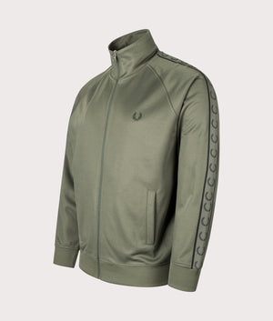 Contrast Tape Track Top in Laurel Wreath Green by Fred Perry. EQVVS Shot.