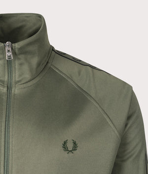 Contrast Tape Track Top in Laurel Wreath Green by Fred Perry. EQVVS Shot.