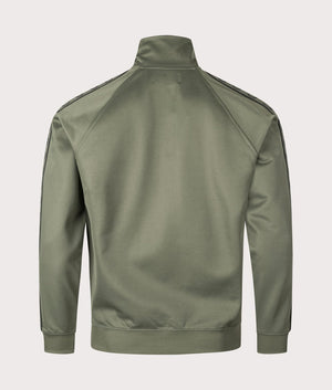 Contrast Tape Track Top in Laurel Wreath Green by Fred Perry. EQVVS Shot.