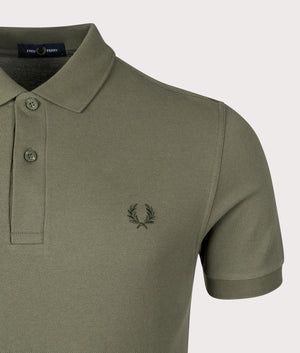 The Fred Perry Polo Shirt in Laurel Wreath Green by Fred Perry. EQVVS Shot.