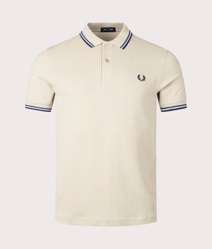 Twin Tipped Polo Shirt Cream by Fred Perry. Shot at EQVVS. Front shot. 