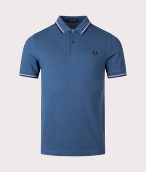 Fred Perry twin-tipped polo in midnight blue, 100% cotton at EQVVS. Front shot. 