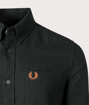 Fred Perry Oxford Shirt in Night Green, 100% Cotton. At EQVVS Menswear. Front logo shot