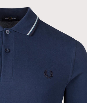 Fred Perry Long Sleeve Twin Tipped Polo Shirt in Tennis Blue. Shot at EQVVS. Detail shot.