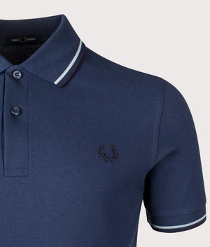 Fred Perry Twin Tipped Polo Shirt in Tennis Blue. Shot at EQVVS. Detail shot. 