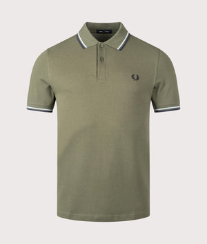 Fred Perry Twin Tipped Polo Shirt in Laurel Wreath Green / Tennis Blue. Shot at EQVVS.  Front shot. 