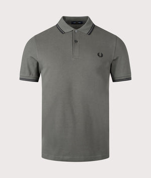 Fred Perry Twin Tipped Polo Shirt in Field Green. Shot at EQVVS.  Front shot.