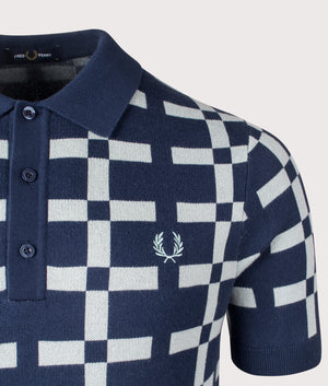 Fred Perry Geometric Jacquard Knit Polo Shirt in Tennis Blue. Shot at EQVVS.  Detail shot. 