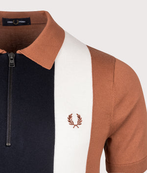 Vertical Stripe Polo Shirt in Cinnamon by Fred Perry. Shot at EQVVS. 