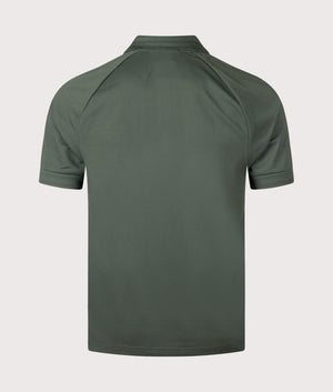 Fred Perry Zip Neck Polo Shirt in Court Green. Shot at EQVVS. Reverse shot. 