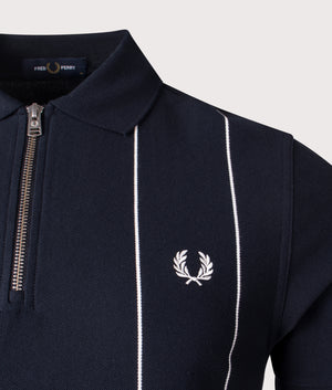 Fred Perry Pinstripe Zip Neck Polo Shirt in Navy. Shot at EQVVS.  Detail shot. 