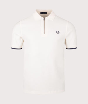 Fred Perry Crepe Pique Zip Neck Polo Shirt in Ecru. Shot at EQVVS. Front shot.