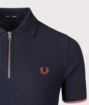 Fred Perry Crepe Pique Zip Neck Polo Shirt in Navy. Shot at EQVVS.  Detail shot. 