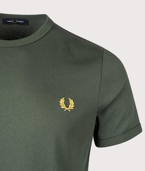 Fred Perry Ringer T-Shirt in Court Green. Shot at EQVVS.  Detail shot. 