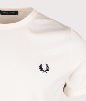 Fred Perry Ringer T-shirt in Ecru, 100% cotton at EQVVS. Detailed logo shot. 