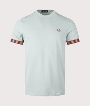 Striped Cuff T-Shirt in Silver blue by Fred Perry. Shot at EQVVS. Front Shot. 
