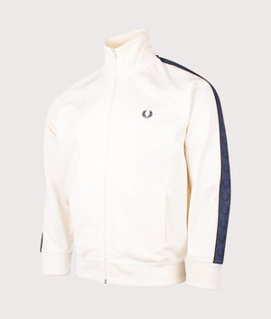 Fred Perry Contrast Tape Track Jacket in Ecru/Tennis Blue at EQVVS. Side shot. 