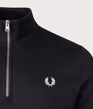 Fred Perry Quarter Zip Sweatshirt in Black, 100% Cotton at EQVVS. Detailed Logo shot. 