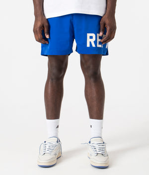 Regular Fit Represent Swim Shorts in Cobalt by Represent. EQVVS Front Angle Shot.