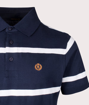 Henri-Lloyd Salcombe Polo Shirt in Navy Blue. Shot at EQVVS. Detail shot