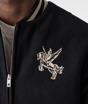 Bellerophon Wool Varsity Jacket in Jet Black by Represent. EQVVS Model Detail embroidery Shot. 