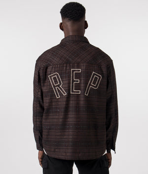 Oversized Rep Flannel Shirt in Coffee from REPRESENT. Back angle model shot at EQVVS.