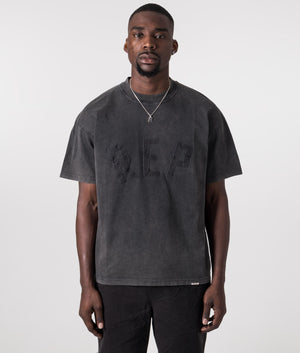 Rep Applique T-Shirt in Vintage Black by Represent. EQVVS Model Shot. 