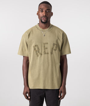 Rep Applique T-Shirt in Fawn by Represent. EQVVS Model Shot. 