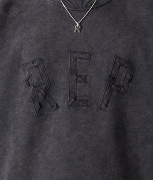 Rep Applique Sweatshirt in Vintage Black by Represent. EQVVS Model Shot. 