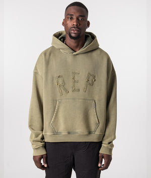 Rep Applique Hoodie in Fawn by Represent. EQVVS Model Shot. 