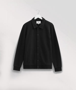 Wax London Hays Jersey Overshirt in Black. Front Hanging Shot at EQVVS.